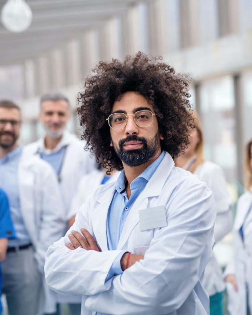 group-of-doctors-standing-in-corridor-on-medical-conference-e1623252293962-2.jpg